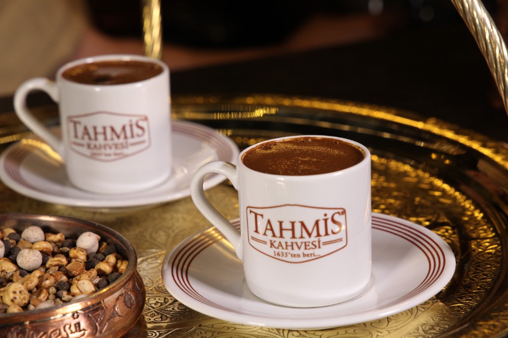 Two cups of Tahmis Turkish coffee served on a traditional brass tray
