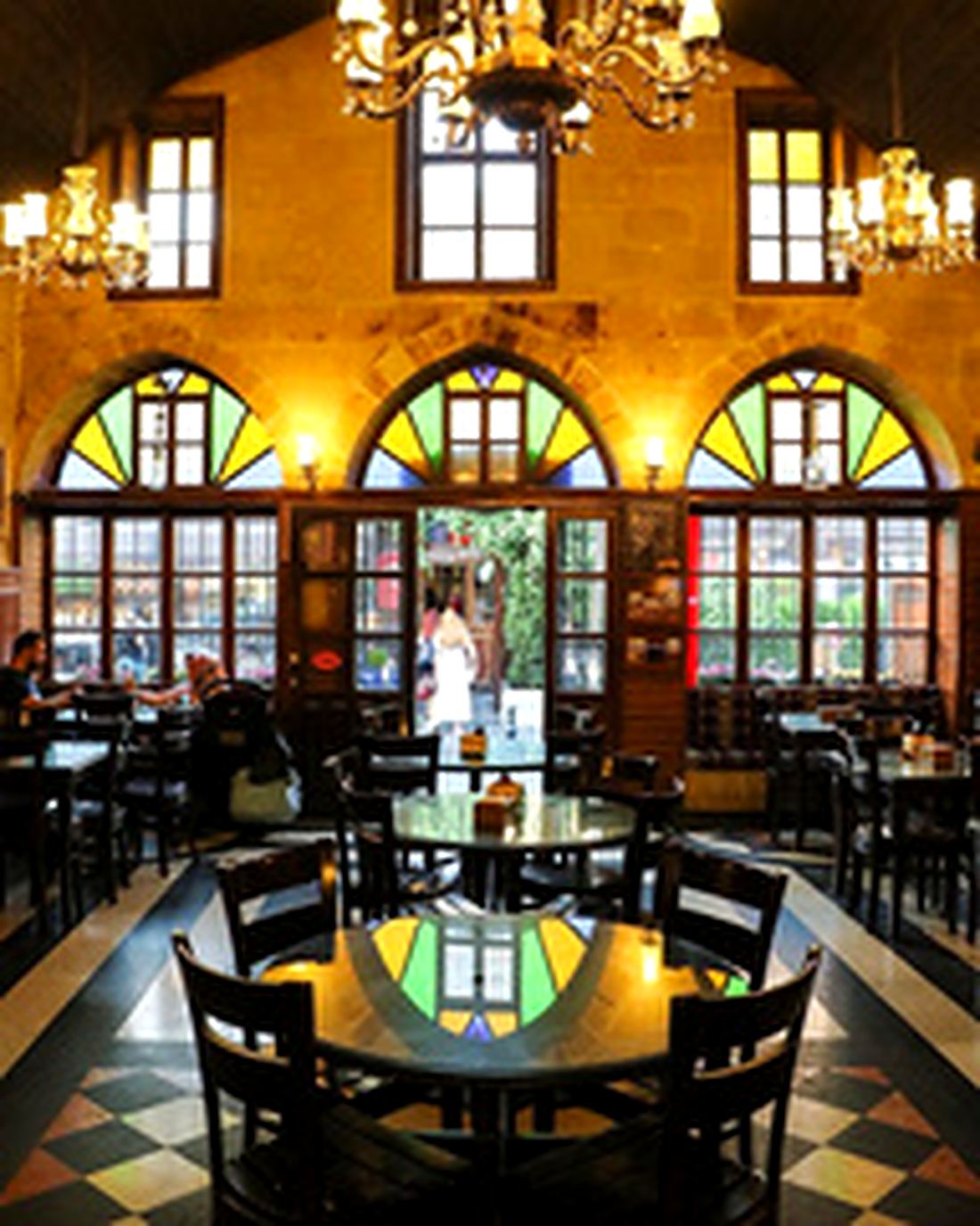 Interior of Tahmis Coffee House showing Ottoman arches and stained glass